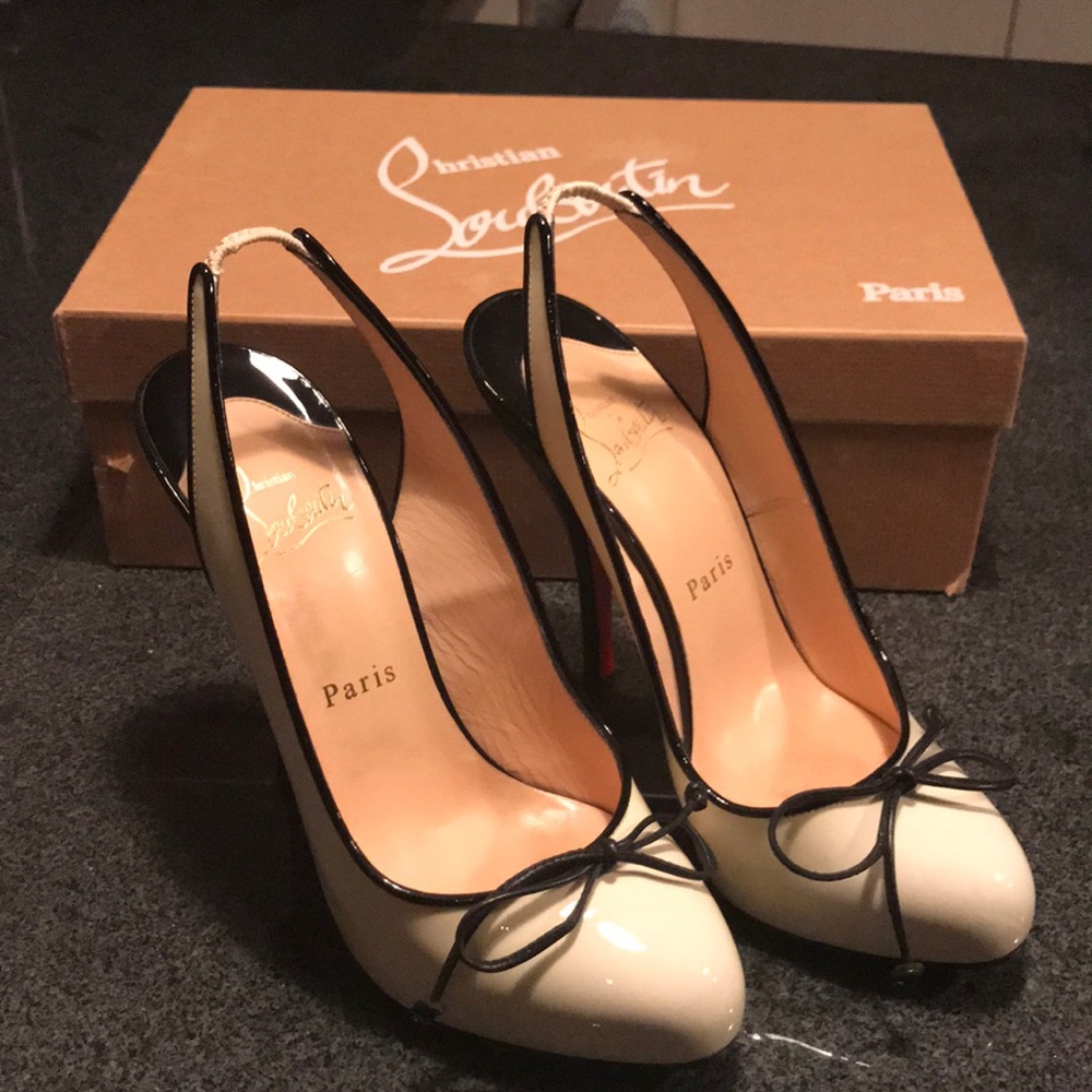 Gorgeous Christian Louboutin sling black heels.